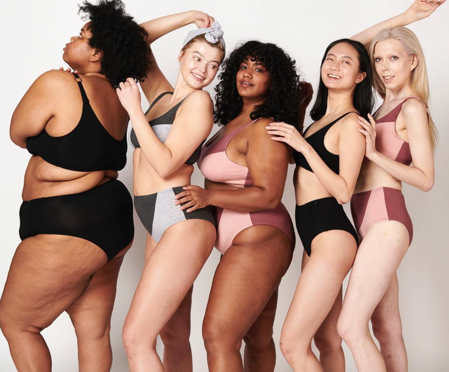 Five woman all wearing sustainably made recycled cotton bras and underwear in black, pink, and grey. One woman wearing a zero waste light grey headband. All pieces from wearwell personal stylist subscription membership.